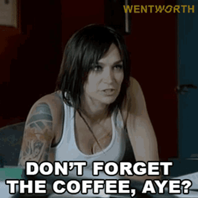 a woman with a tattoo on her arm says " don t forget the coffee aye "