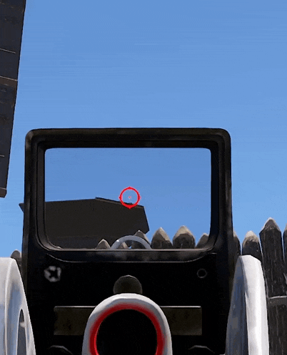 a red circle in the middle of a rifle scope
