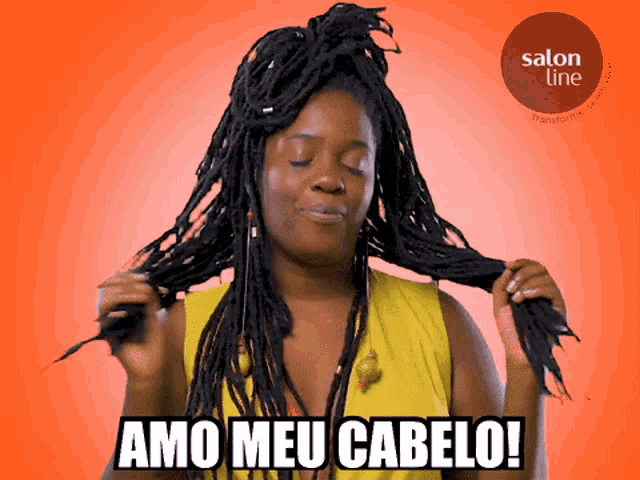 a woman holding her hair with the words amo meu cabelo