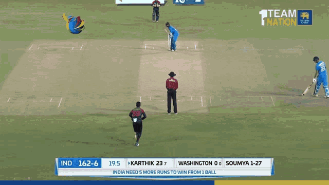 a cricket match between india and washington is being shown on a television screen