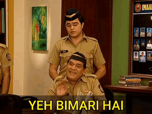 a man in a police uniform is sitting at a desk with the words yeh bimari hai written below him