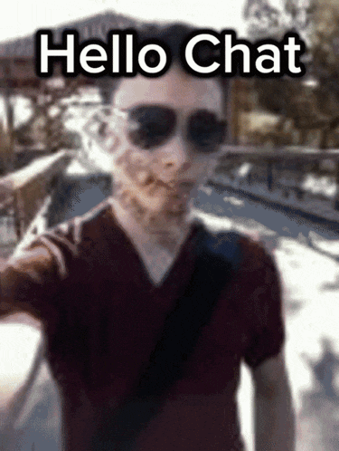a blurry picture of a man wearing sunglasses with the words hello chat written above him