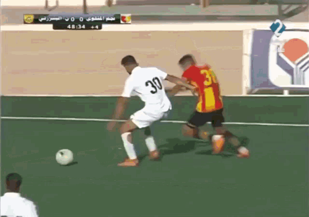 a soccer player with the number 30 on their jersey