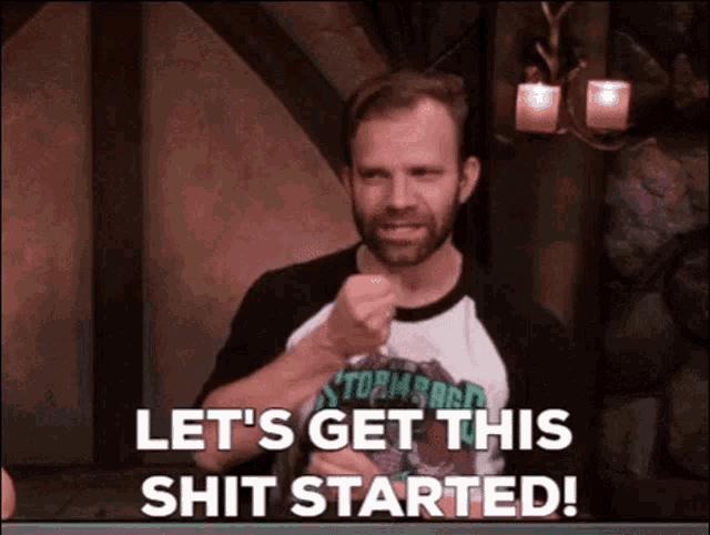 a man says let 's get this shit started while pointing