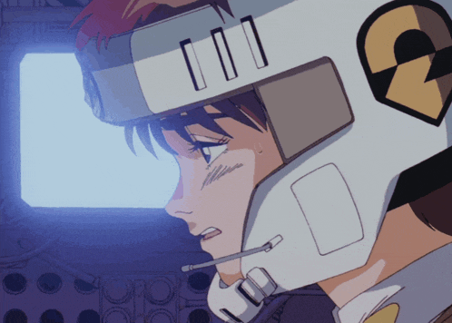 a person wearing a white helmet with the letter c on it