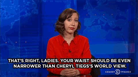a woman in a red shirt says that 's right ladies your waist should be even