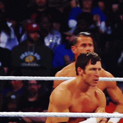 two men in a boxing ring with one wearing a shirt that says ' new york '