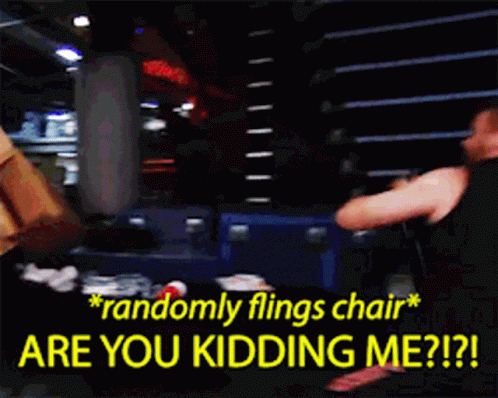 Wwe Kevin Owens GIF - Wwe Kevin Owens Randomly Flings Chair GIFs