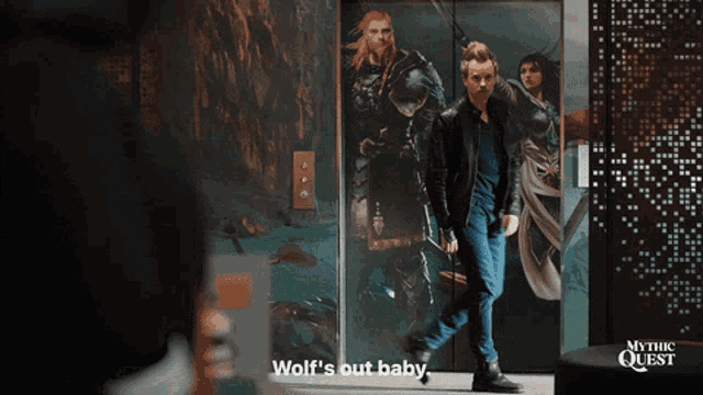 a man in an elevator with the words wolf 's out baby