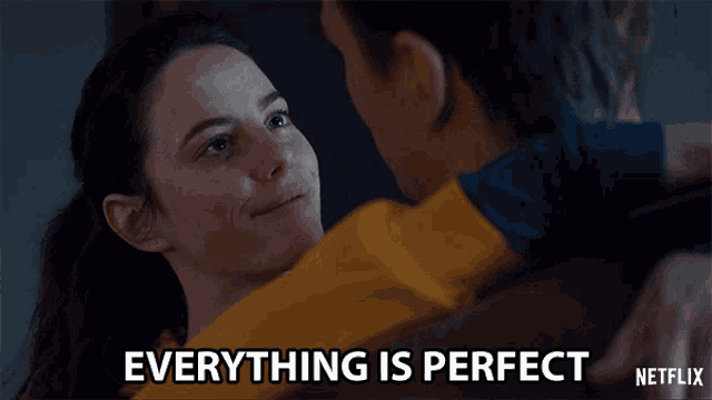 a netflix advertisement shows a man and a woman hugging and says " everything is perfect "