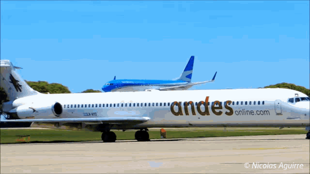 a plane that says andes online.com sits on a runway