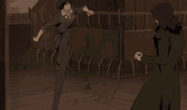 a man in a green shirt is punching another man