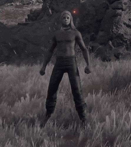 a naked woman is standing in a field with a sword