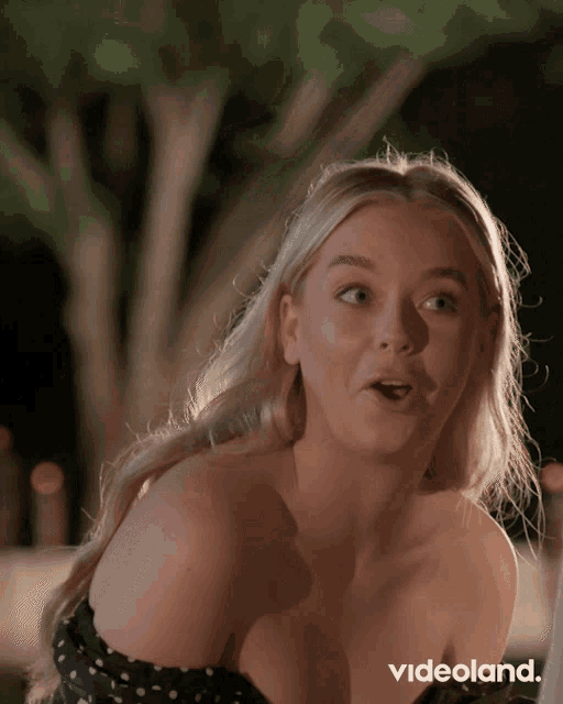 a woman with a surprised look on her face is featured on a videoland ad