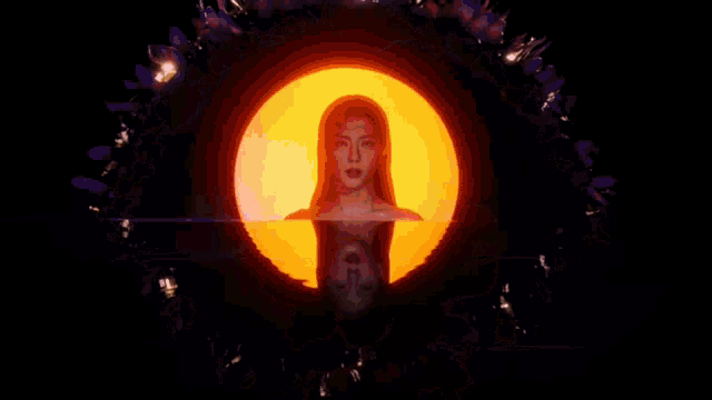 a woman with long red hair is standing in front of a yellow circle .