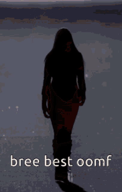 a blurry picture of a woman in a red dress with the words bree best oomf on the bottom
