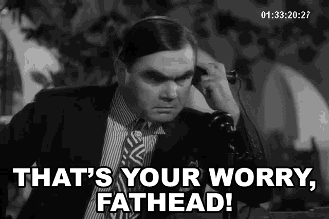 a man talking on a phone with the words that 's your worry fathead on the screen