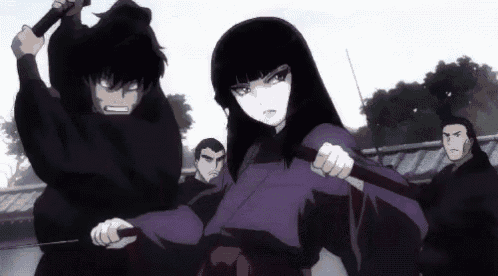 a group of people are standing next to each other holding swords and knives .
