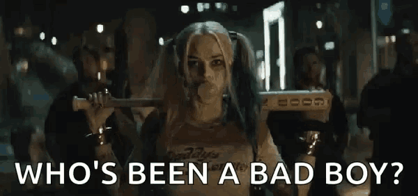 harley quinn from suicide squad is holding a bat and blowing bubbles while holding a bat .