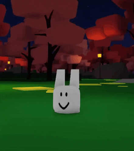 a white bunny is laying on its back in the grass
