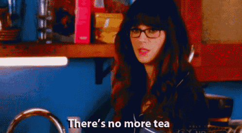 a woman with glasses is sitting in a kitchen and says there 's no more tea .