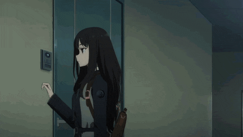 a girl with long black hair is wearing a black uniform with a badge on it