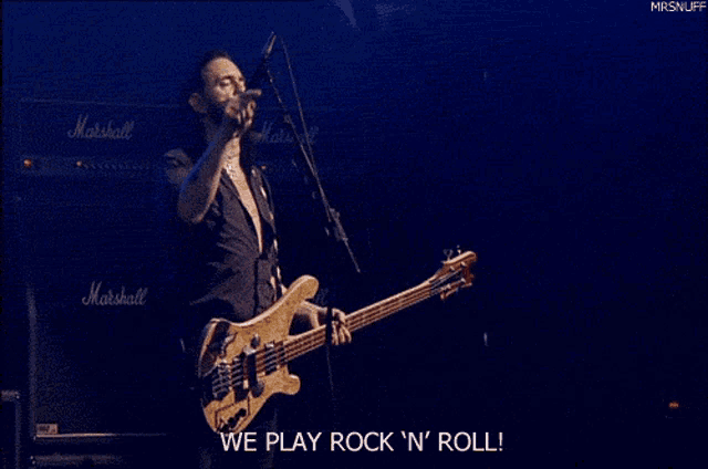 a man playing a bass guitar with the words we play rock n ' roll written below him