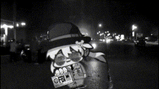 a black and white photo of a man with a fbi license plate