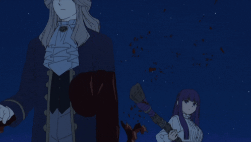 a man and a woman are standing next to each other in a dark room