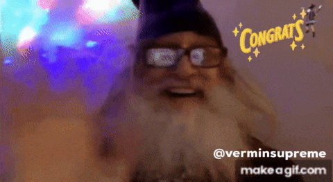 a man with a beard and glasses says congrats on a gif