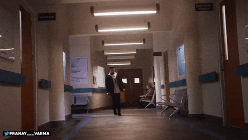 a hospital hallway with a sign for ambulance patient