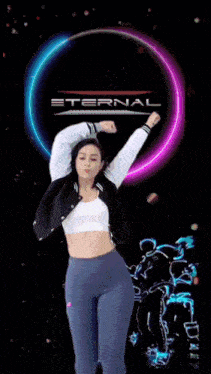 a woman is dancing in front of a eternal logo