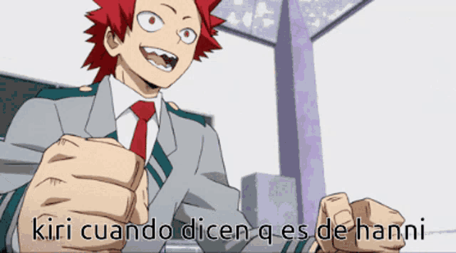 a man in a suit and tie with the words kiri cuando dicen q es de hanni below him