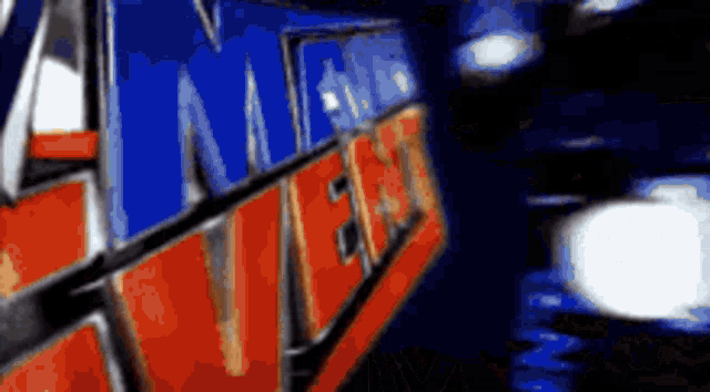 a red white and blue sign with the word news