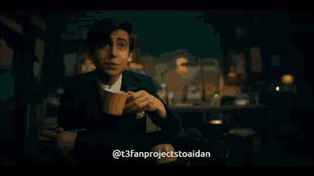 a man in a suit is holding a cup of coffee with the words good morning below him
