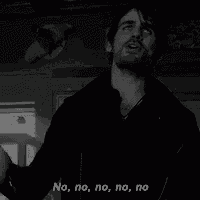 a black and white photo of a man smoking a cigarette and saying no , no , no , no .
