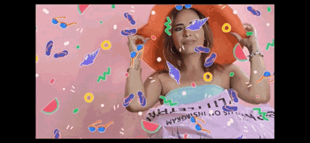 a woman wearing a hat and sunglasses is surrounded by watermelons and confetti