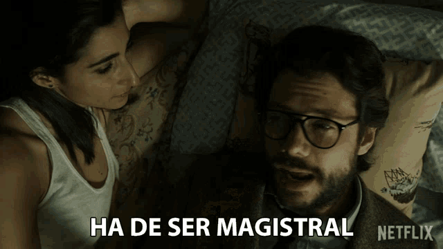 a man and a woman laying on a bed with ha de ser magistral written on the bottom of the image