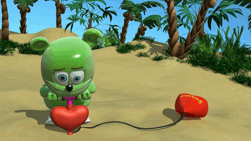 a green gummy bear is pumping a red heart with a red balloon that says perling