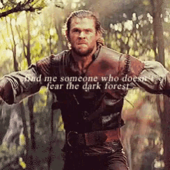a man in a dark forest with a quote that says " find me someone who does not fear the dark forest "