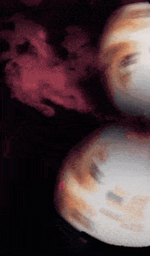 a blurred image of a person 's face with a red light behind them