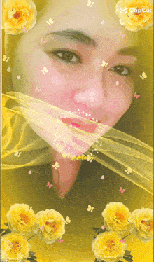 a woman 's face is surrounded by yellow flowers and butterflies and the word capcut is on the bottom