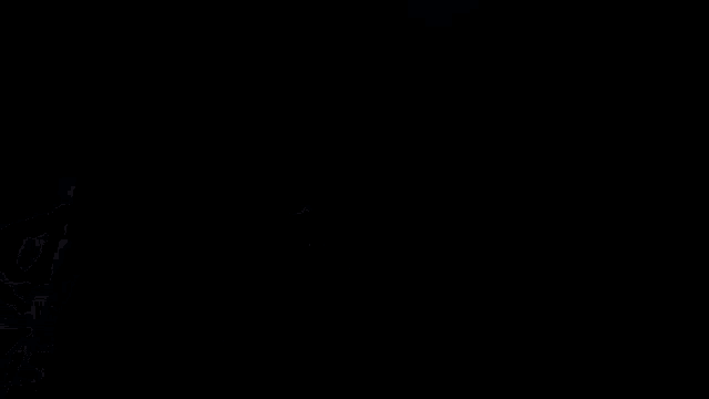 a person playing an electric guitar with a black background