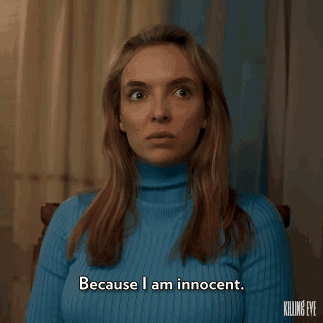 a woman in a blue sweater says because i am innocent on a screen
