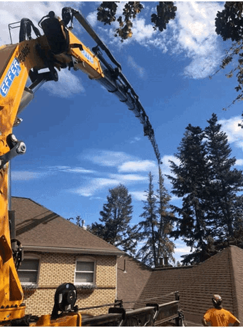a large yellow crane with the word effer on the side