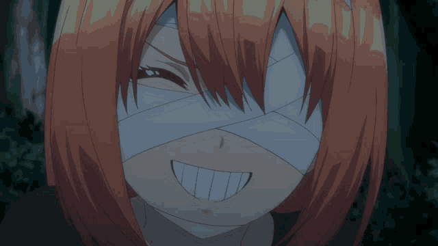 a close up of a girl with a bandage on her face