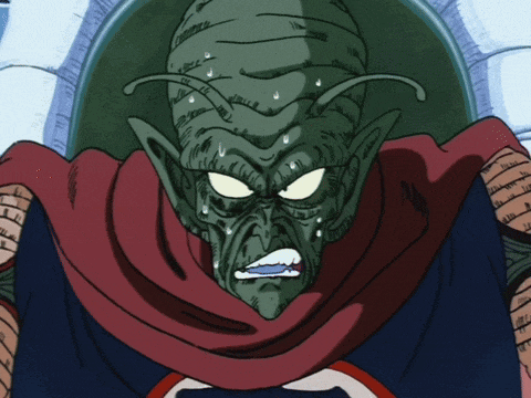 a cartoon character with a scarf around his neck has tears running down his face