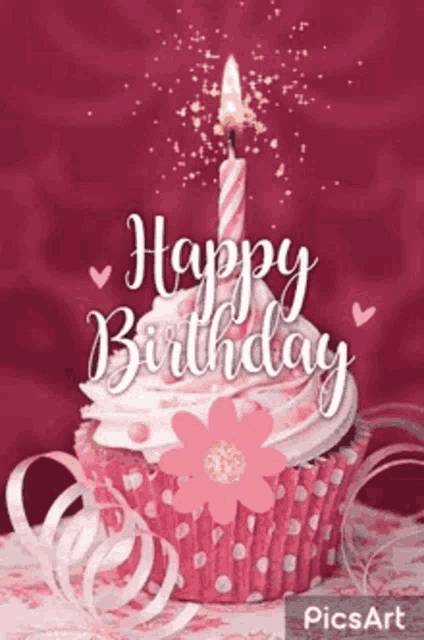 a pink cupcake with a candle on top of it and the words `` happy birthday '' .