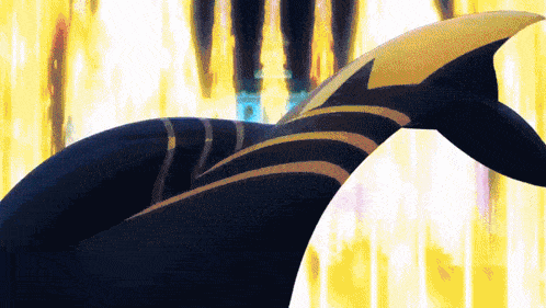 a close up of a dolphin 's tail with yellow stripes