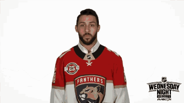 a man wearing a jersey that says what